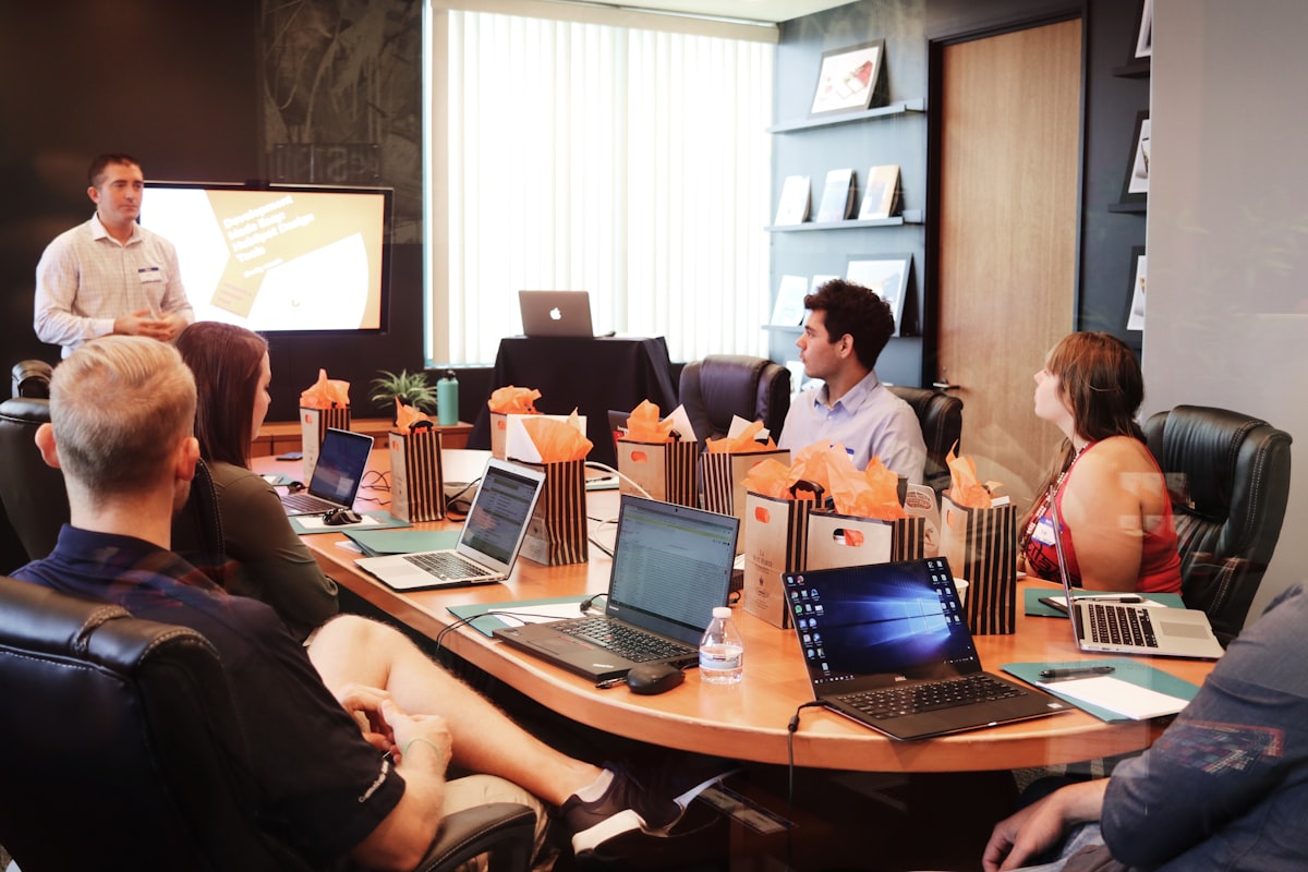 Team reviewing a dashboard on a screen